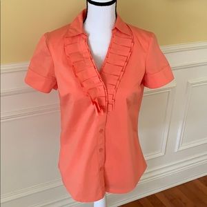 The Limited short sleeve shirt with front ruffle.